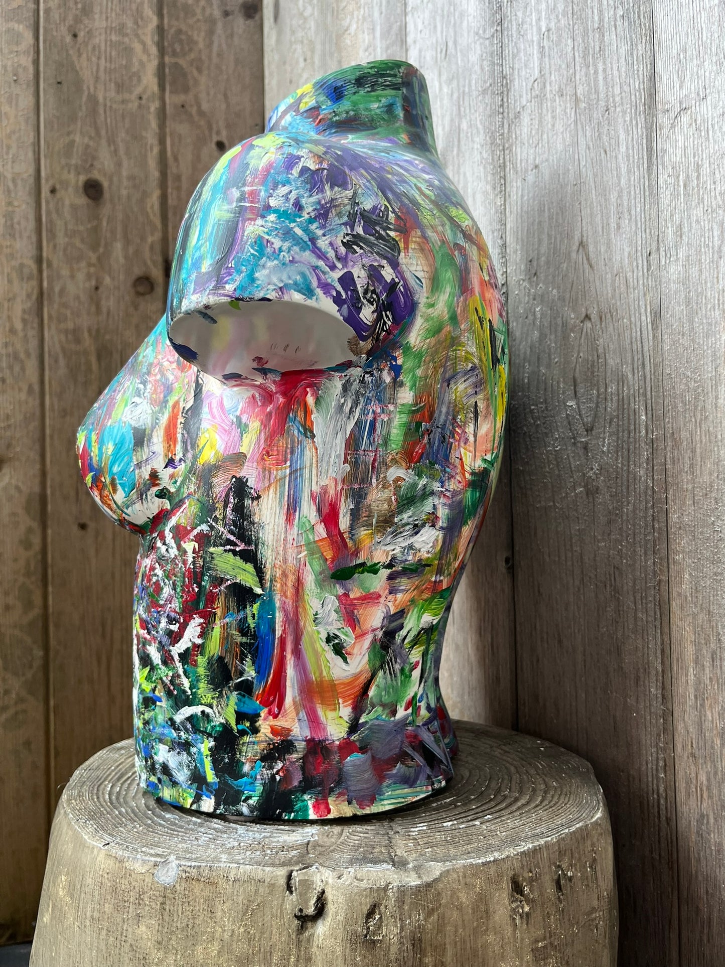 Sculptural wooden torso painted with dynamic abstract patterns, celebrating the female form through Cindy Trestman’s signature style.